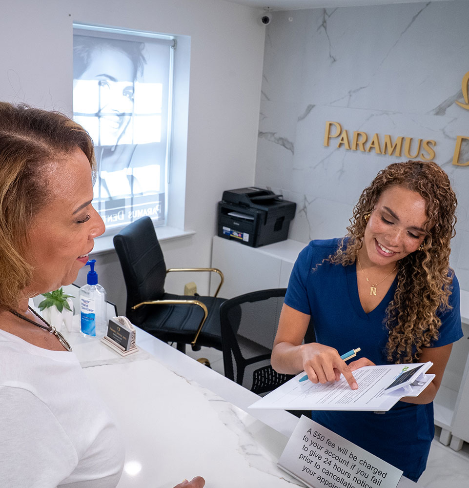 Team member showing Patient finance forms