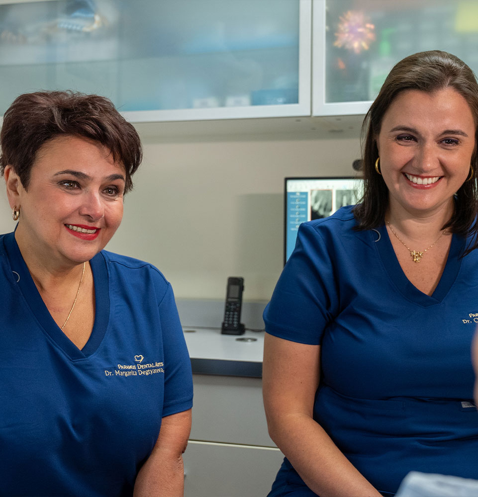 both doctors going over dental procedure inforation with patient
