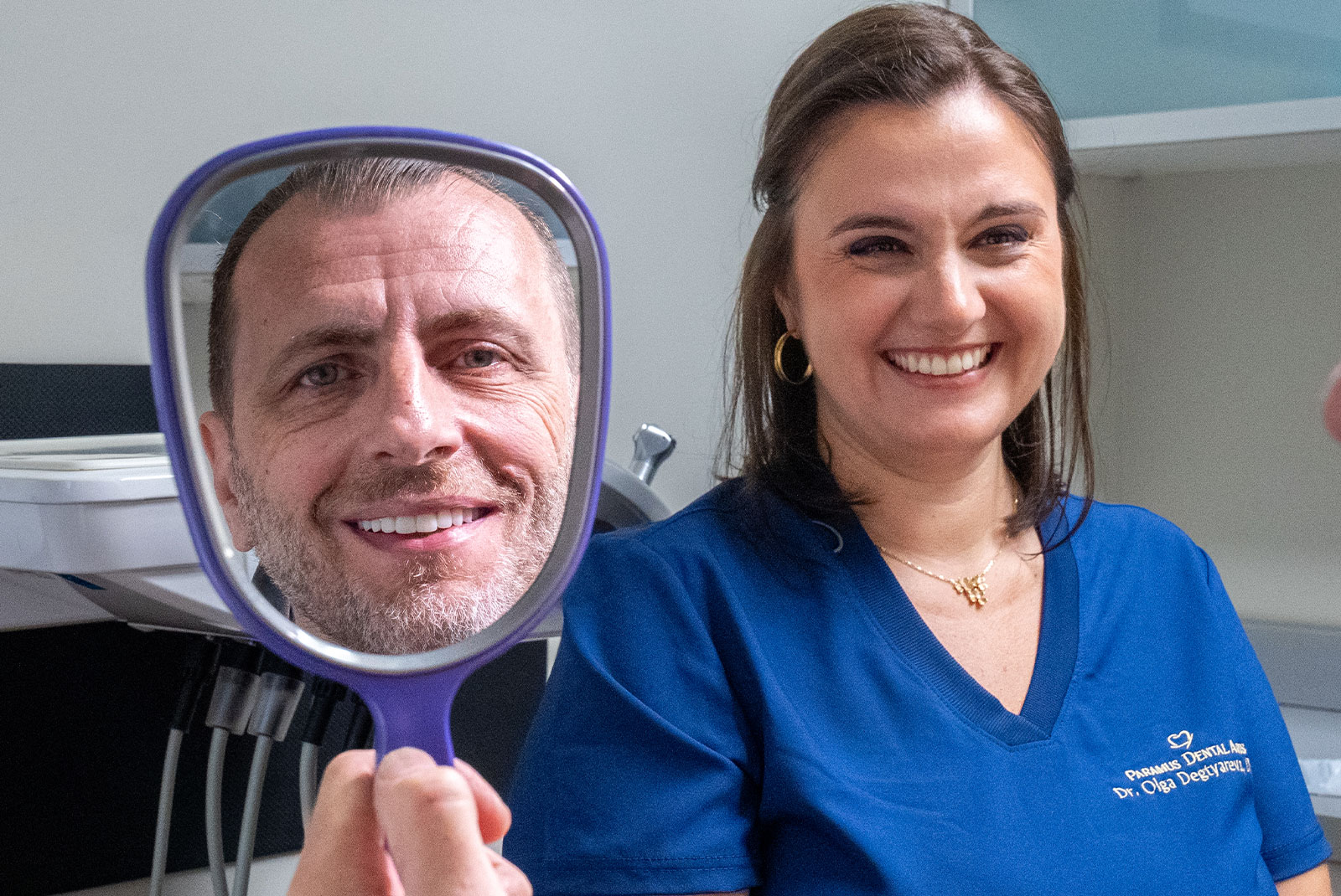 patient smiling brightly after their dental procedure within the dental center