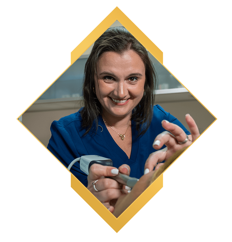 doctor examining patent with dental devices within the center