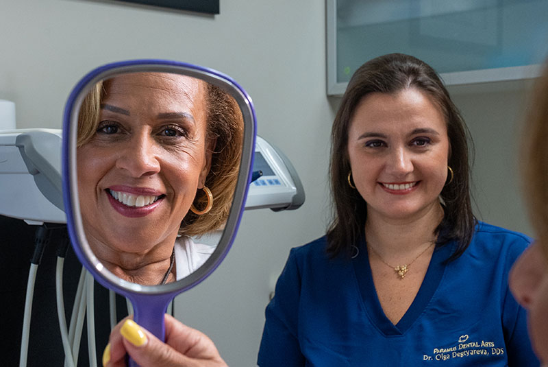 doctor and patient smiling brightly after patient procedure