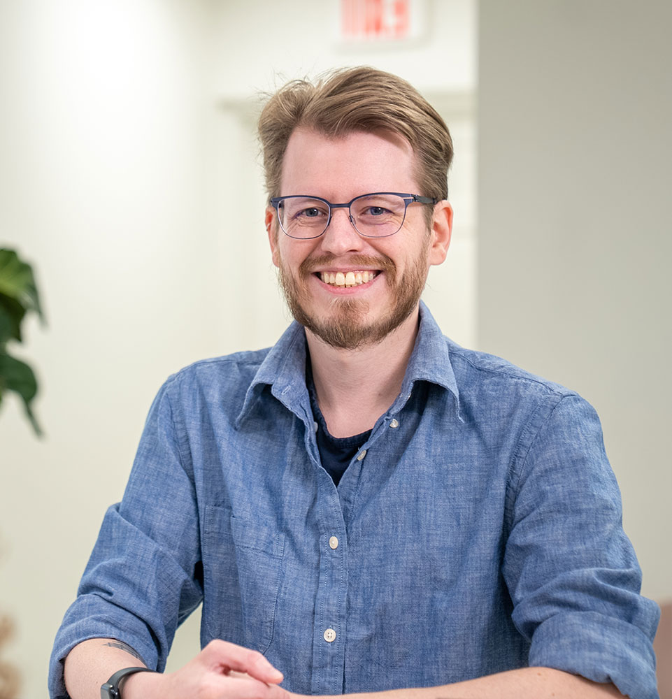 patient being helped at the front desk of the dental center